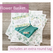 Load image into Gallery viewer, Image of green berry basket, elegant eucalyptus leaf tissue paper and white tissue paper. Also has a round tag attached to a stick and a mini clothespin. The round tag says, “Happy Mother’s Day.” Another tag is also in the image. It reads: "A mother's love is more beautiful than any fresh flower." Debashish Mridha. The elegant tags feature delicate eucalyptus greenery.