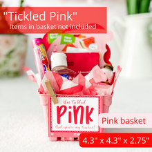 Load image into Gallery viewer, Gift basket kit in pink color. Has chevron tissue paper with 3 shades of pink sitting inside it. A tag is attached to the basket with a mini clothespin. The white tag with pink writing reads "I'm tickled pink you're my teacher." The tag features a hear scalloped pink border. The basket is filled with many pink items. The items pictured in the basket are for presentation purposes only. The gift basket comes empty ready for you to fill.