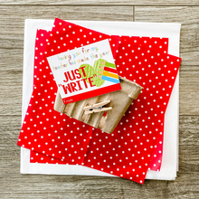 Load image into Gallery viewer, Red tissue paper with white polka dots, natural colored basket, clothespin and tag that reads "having you for my teacher has made this year just WRITE." Pairs great with writing tools. Tag has bright multicolor letters, pencils and a green heart.